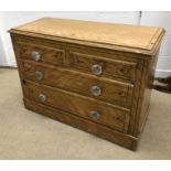 A Victorian painted pine chest of two short over two long drawers with glass handles,