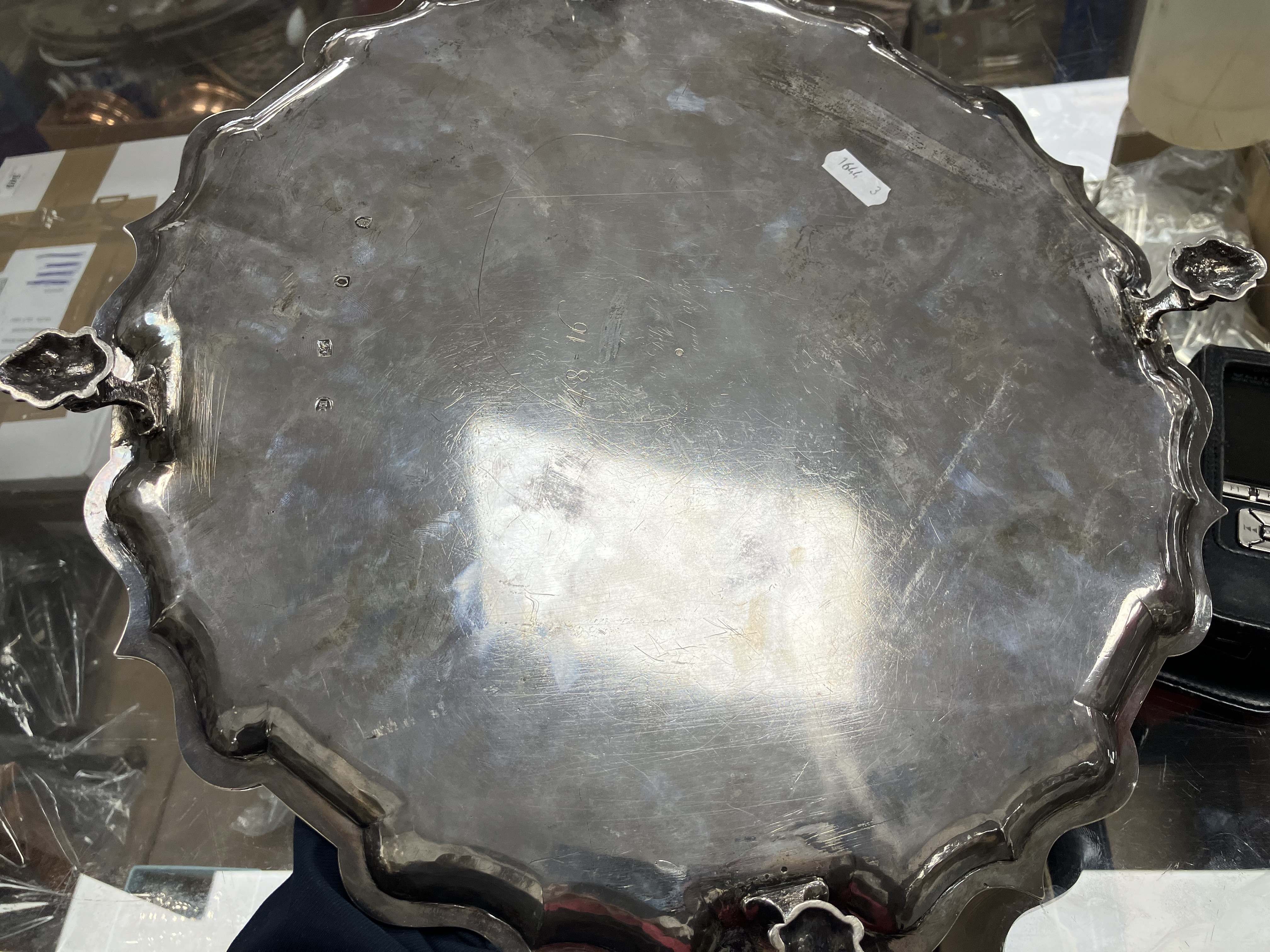 A George II silver salver with pie crust edge raised on four scrolling feet bearing inscription - Image 6 of 8