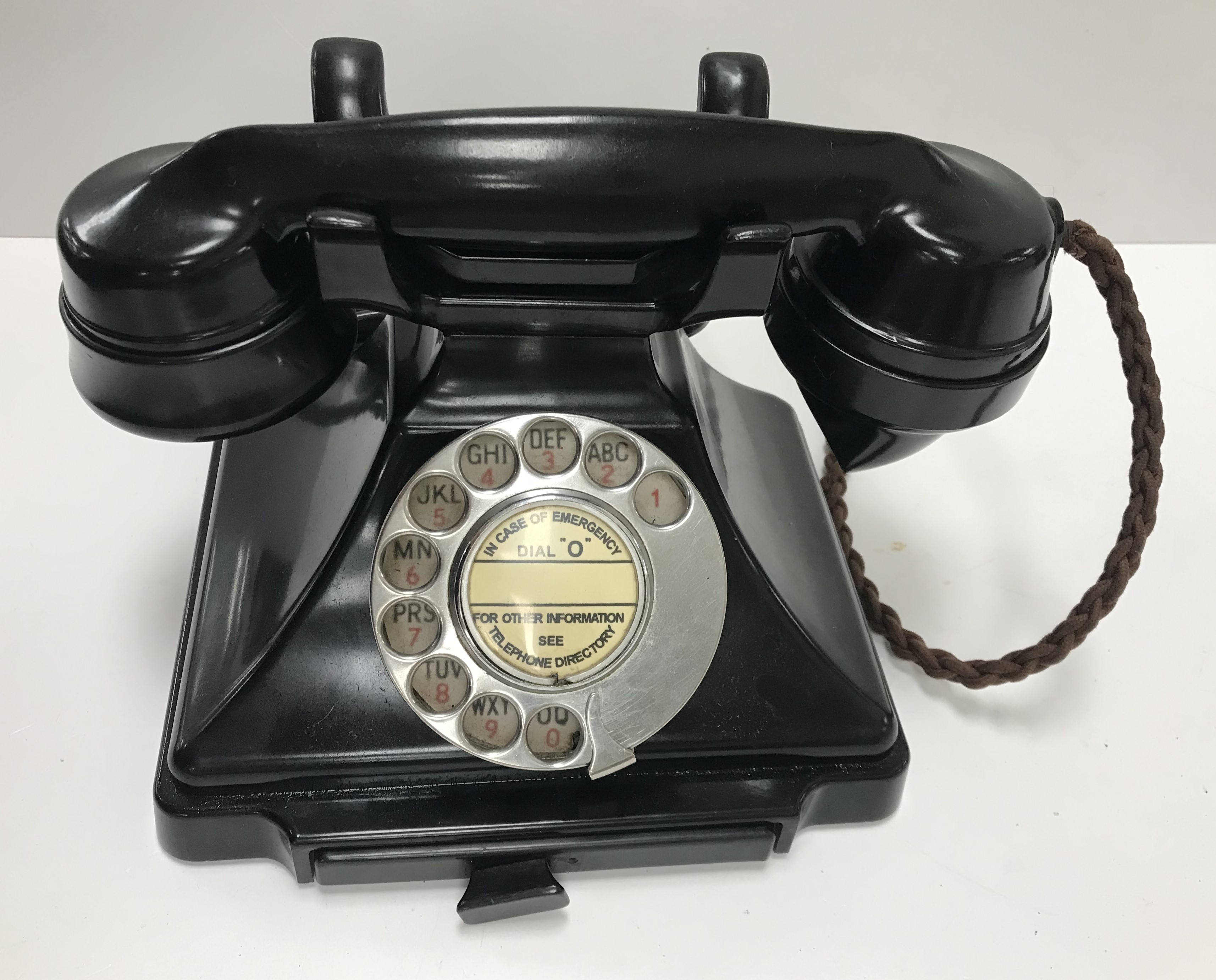 A GPO black bakelite type cased telephone stamped to base "GPO batch sampled 5862...