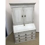 A 19th Century Continental painted oak bureau cabinet,