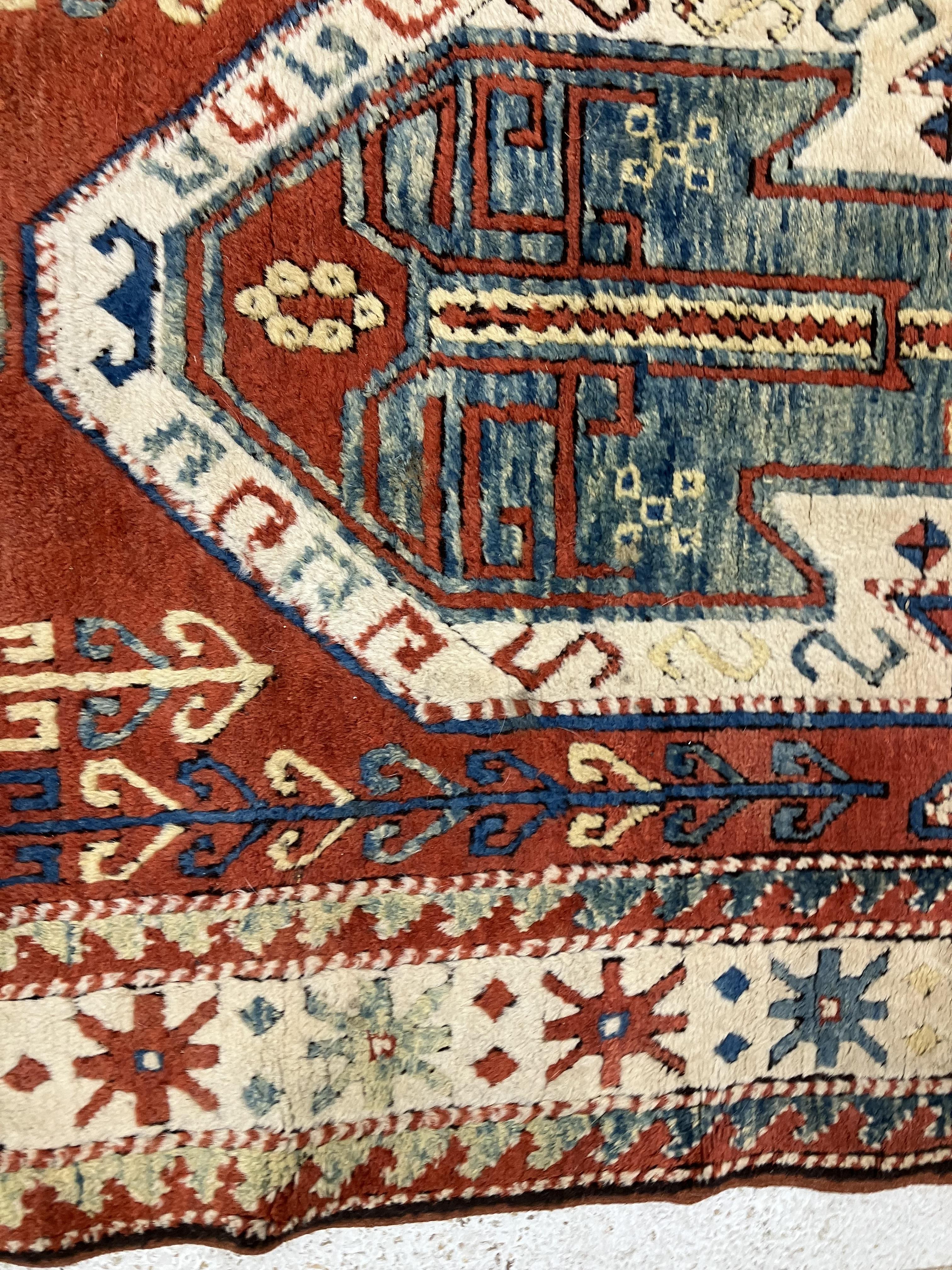 A fine Turkish carpet, - Image 11 of 16