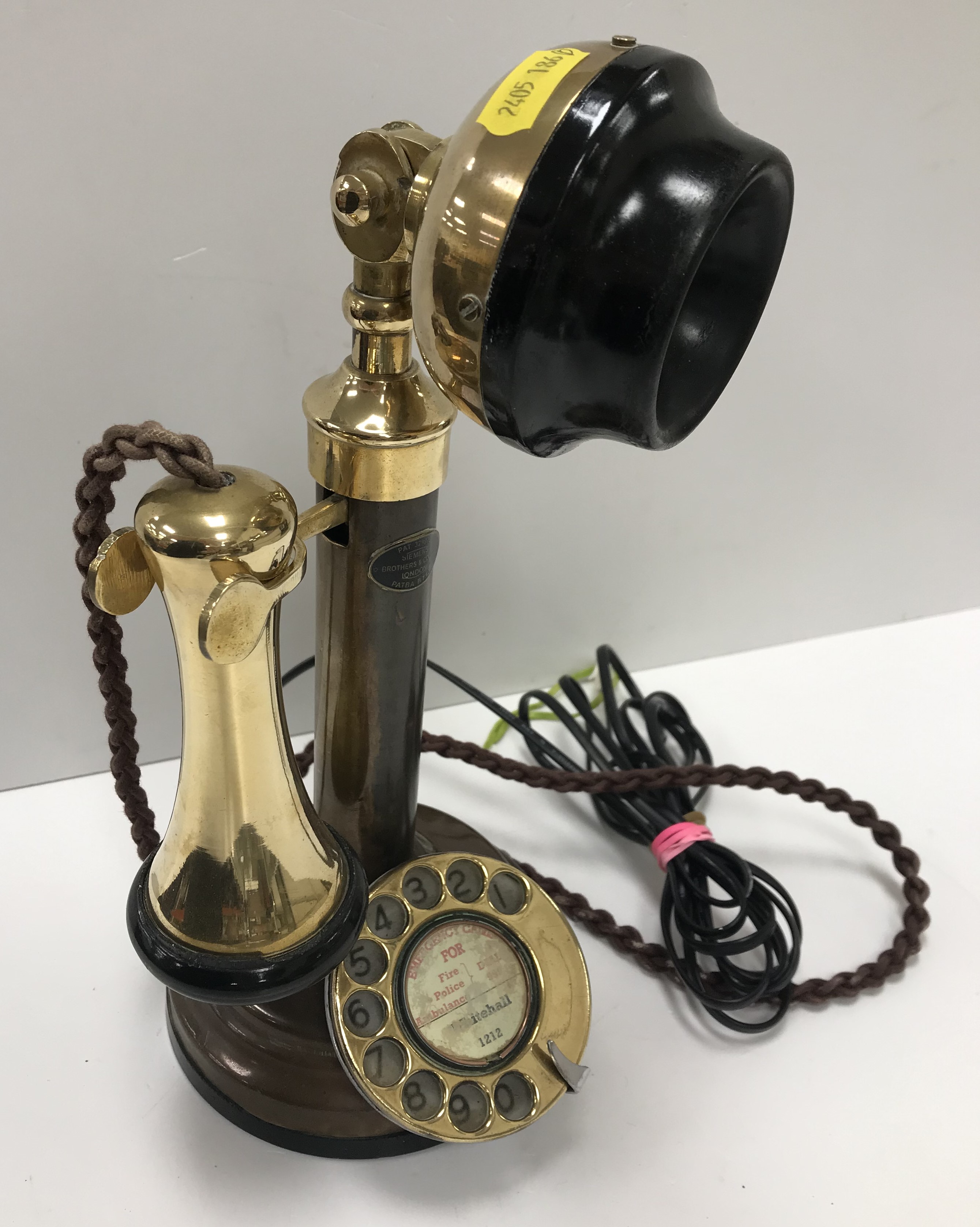 A vintage Siemens Brothers & Co Ltd of London brass candlestick telephone (PATBA-B/1B) 30 cm high