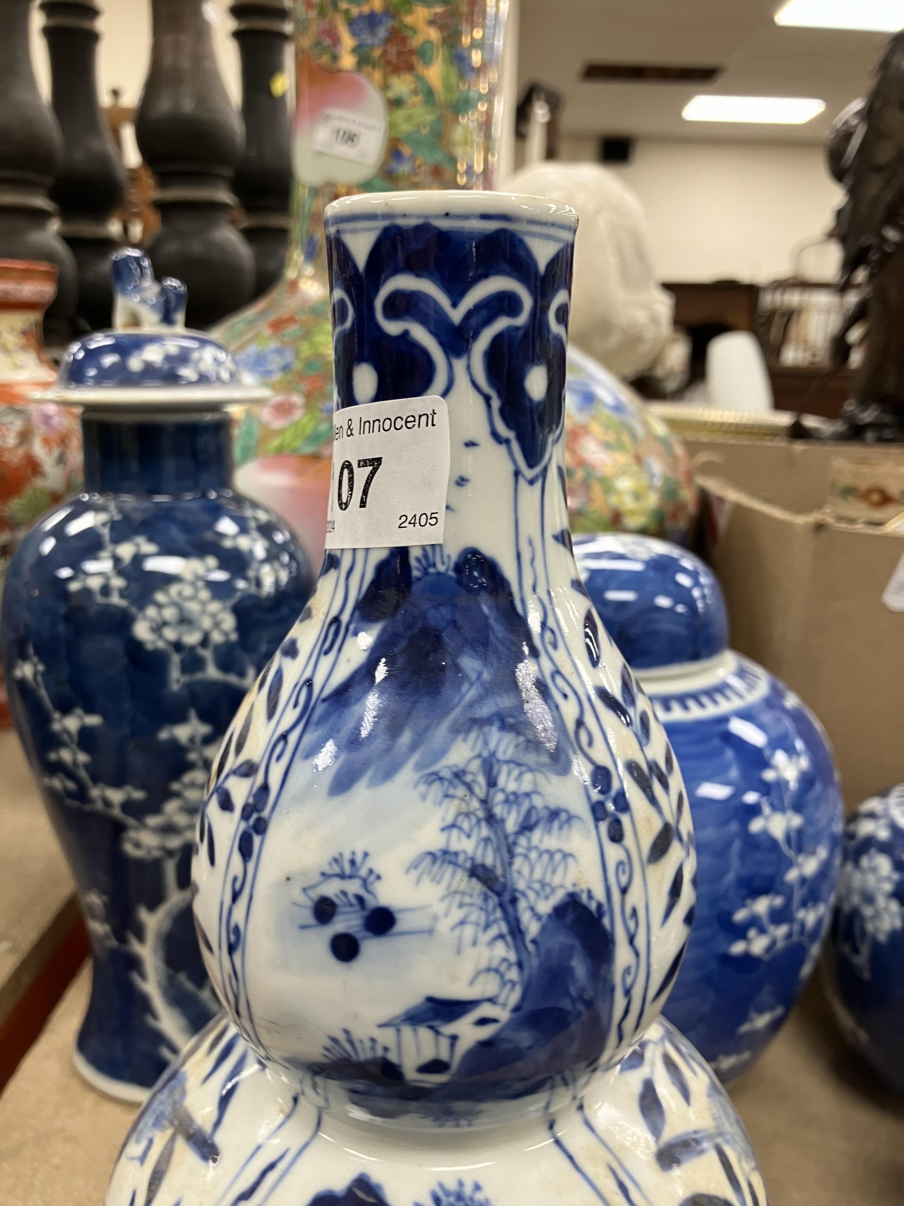 A Chinese blue and white double gourd shaped vase decorated with panels of figures in watery - Image 25 of 26