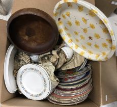 A box of miscellaneous china plates, together with a small metal tray,