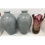 A pair of mottled blue grey glazed vases by Guido Andloviz for Società Ceramica Italiana Lavenia