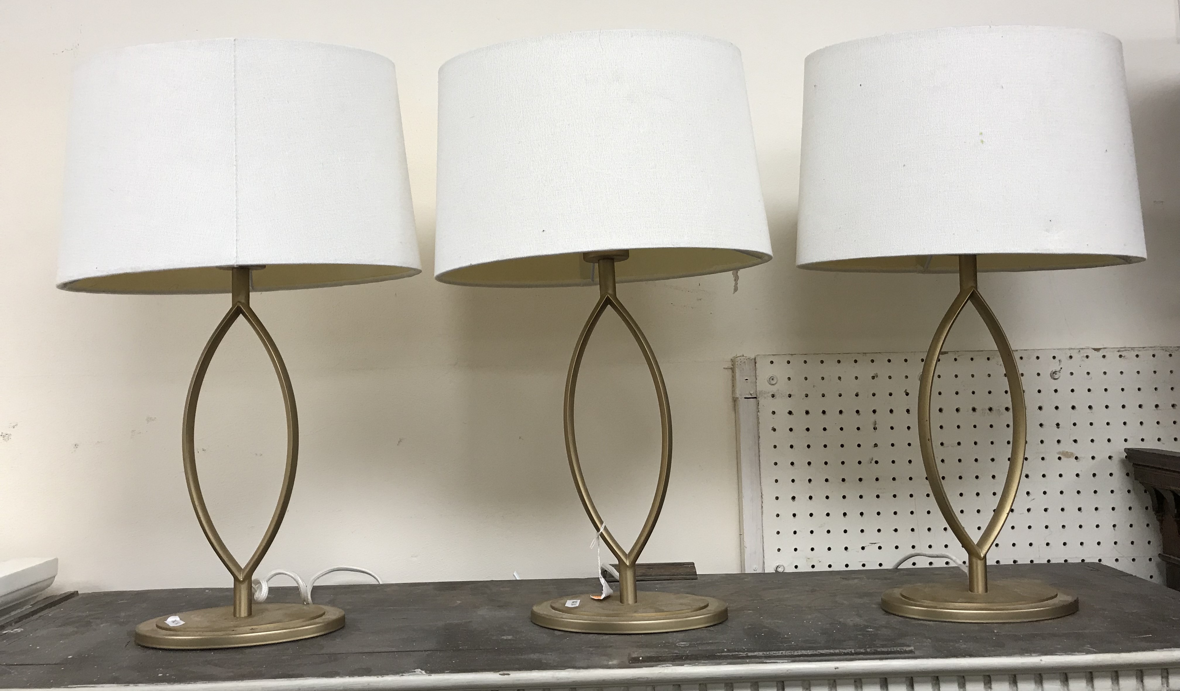 A set of three contemporary gold painted metal navette design table lamps and shades approx. - Image 2 of 6