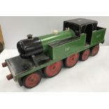 A large scratch built wooden 2-4-4 locomotive model in BR 829 green and black livery by Bob Evans