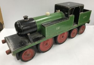 A large scratch built wooden 2-4-4 locomotive model in BR 829 green and black livery by Bob Evans