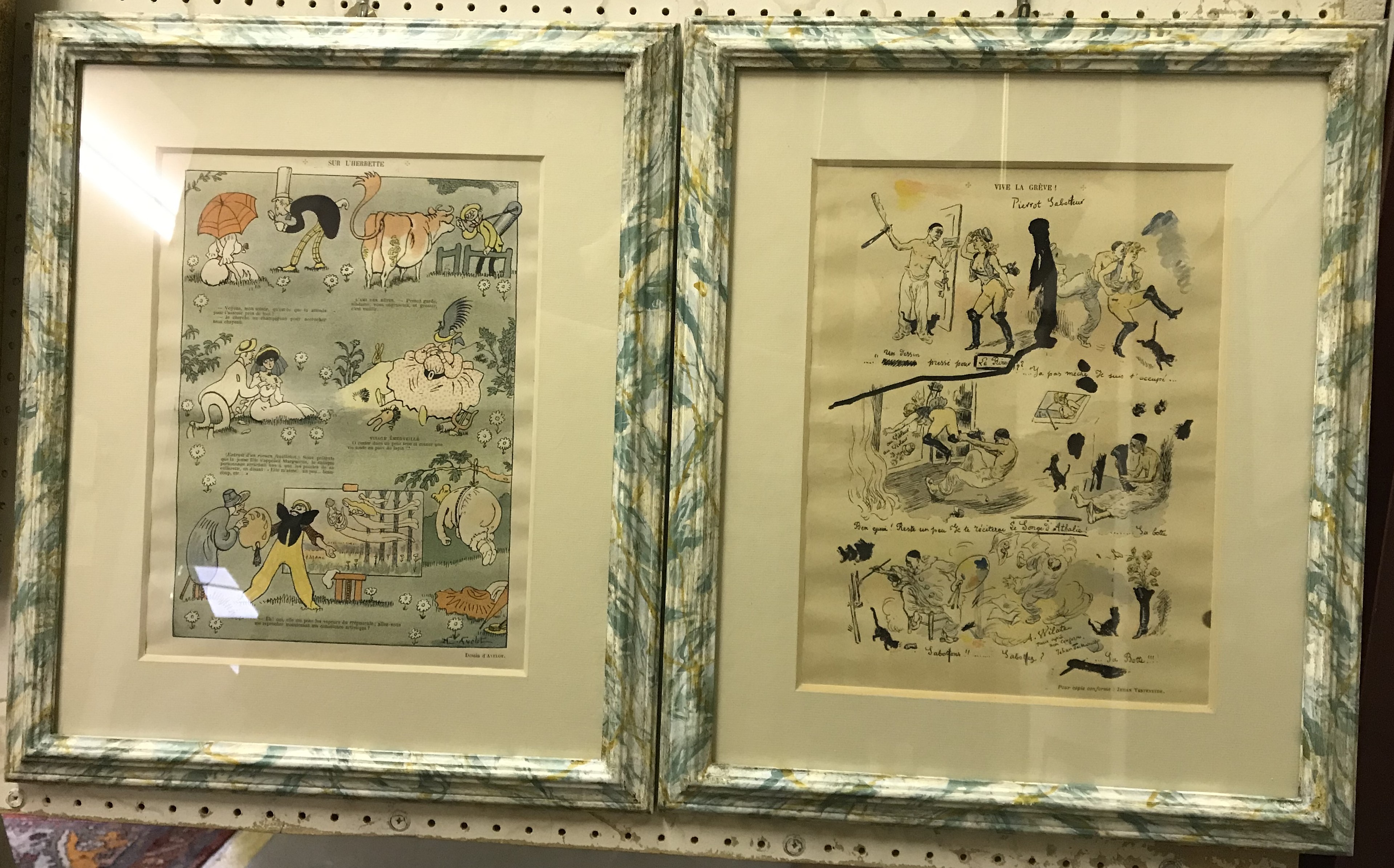 A framed set of twelve French cartoon book / magazine plates depicting various themes / scenes,