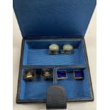 Three pairs of 15 carat gold mounted gent's cufflinks,