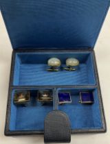 Three pairs of 15 carat gold mounted gent's cufflinks,