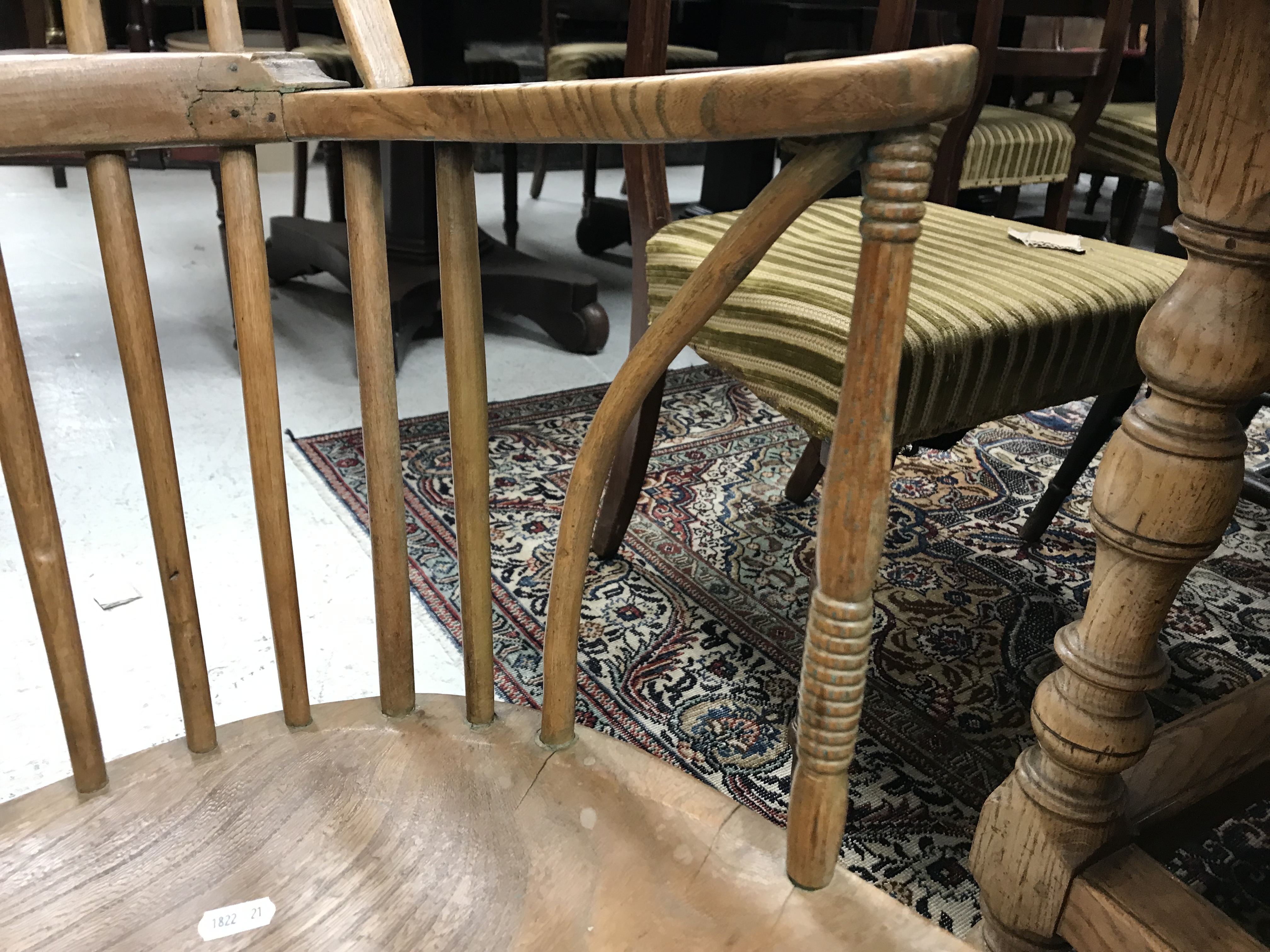 An early 19th Century West Country ash and elm stick back elbow chair, - Image 33 of 39