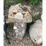 Two natural staddle stones with square tops,