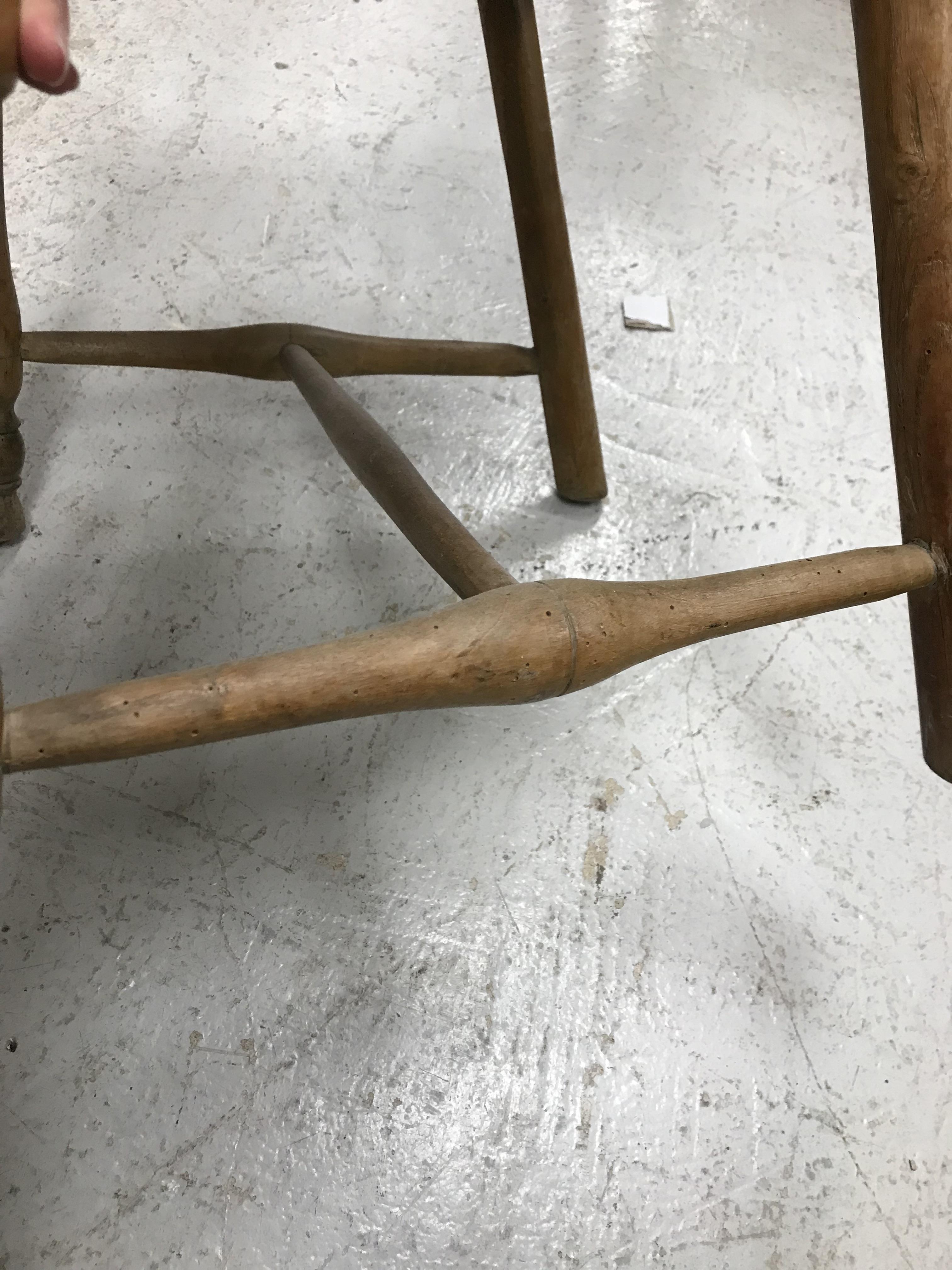 An early 19th Century West Country ash and elm stick back elbow chair, - Image 13 of 39