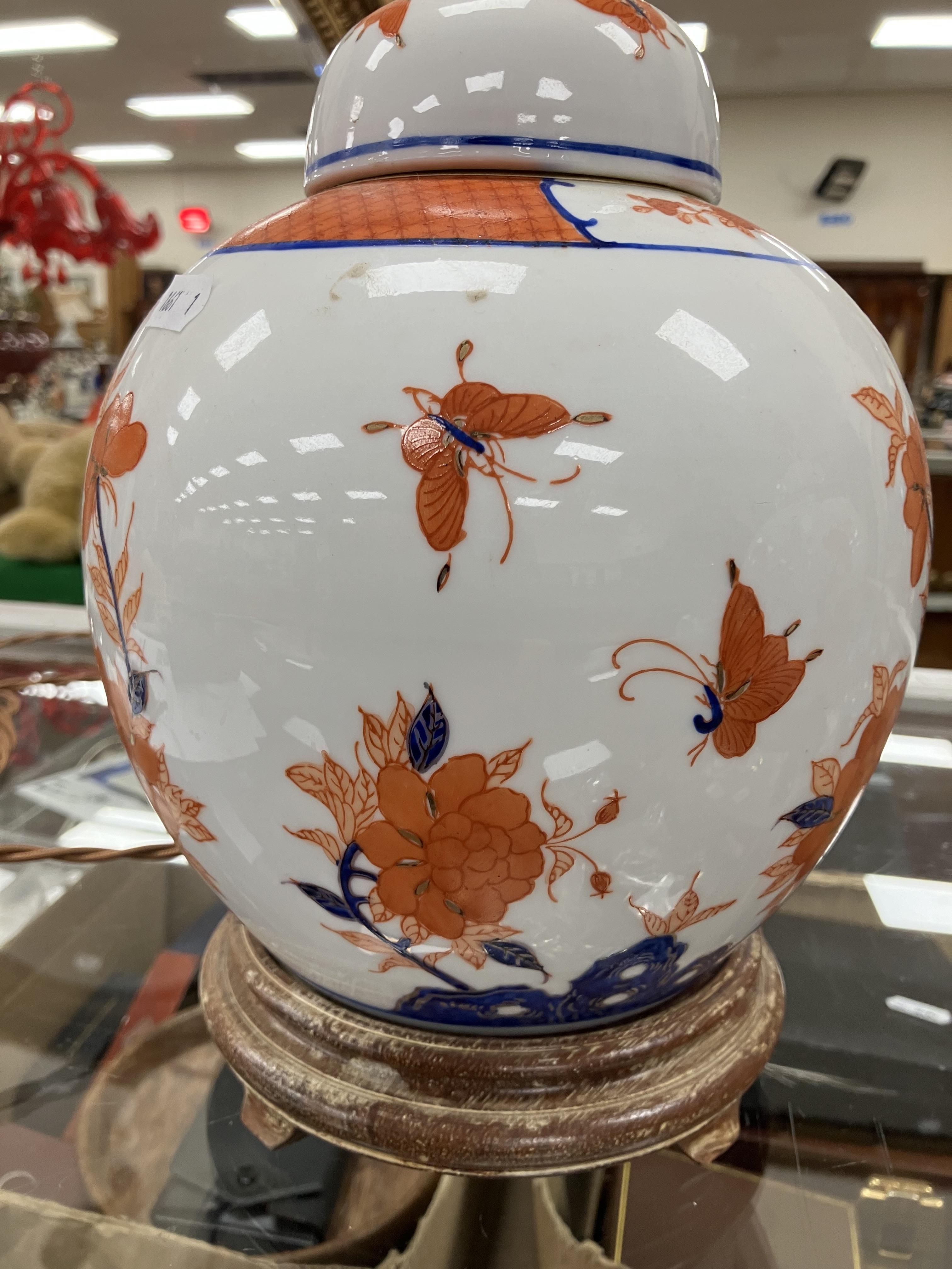 A pair of Japanese porcelain butterfly and flower decorated table lamps of ginger jar form in the - Image 13 of 32