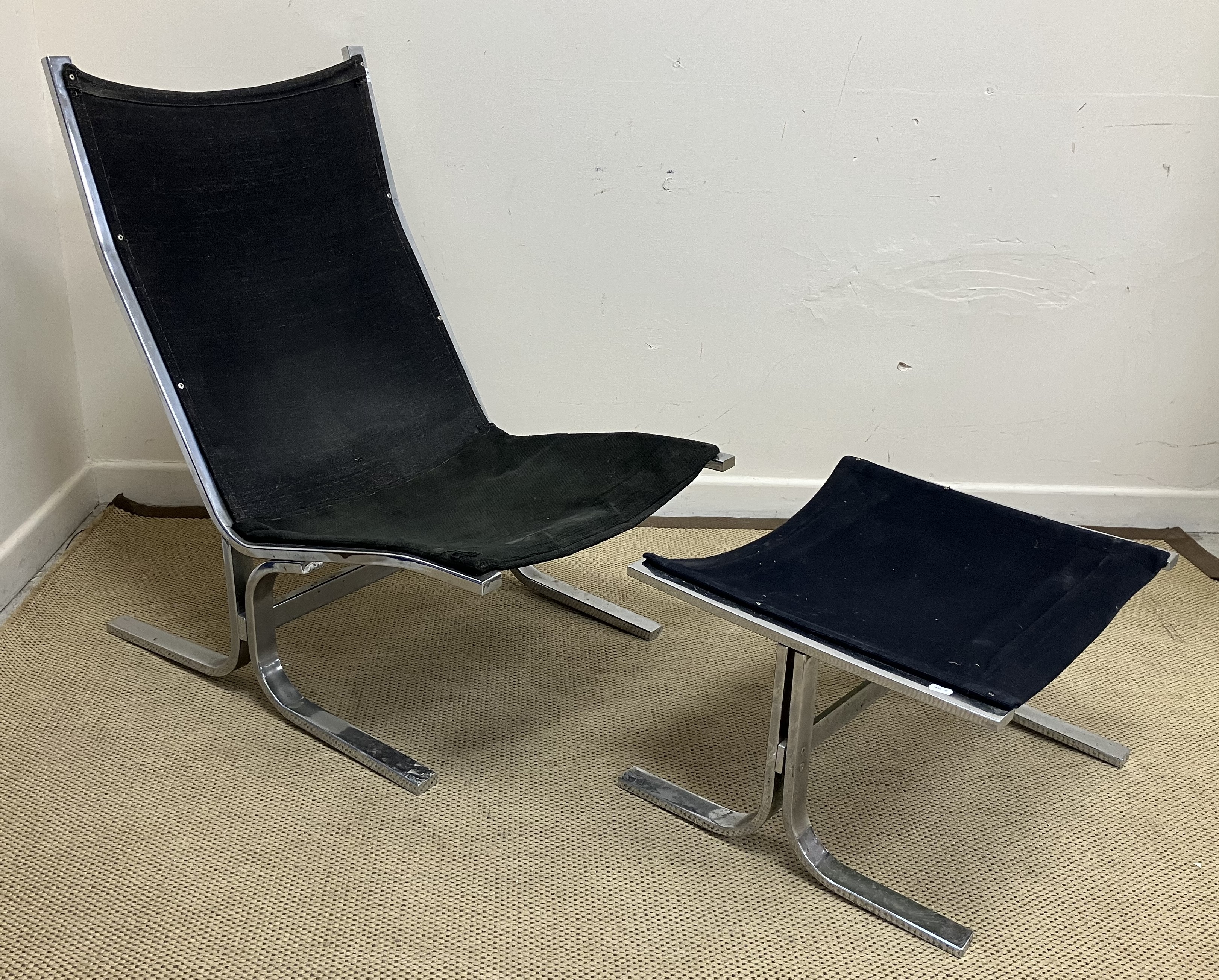 A 20th Century chrome framed chair with black canvas seat and back, 62.5 cm wide x 84 cm deep x 93.