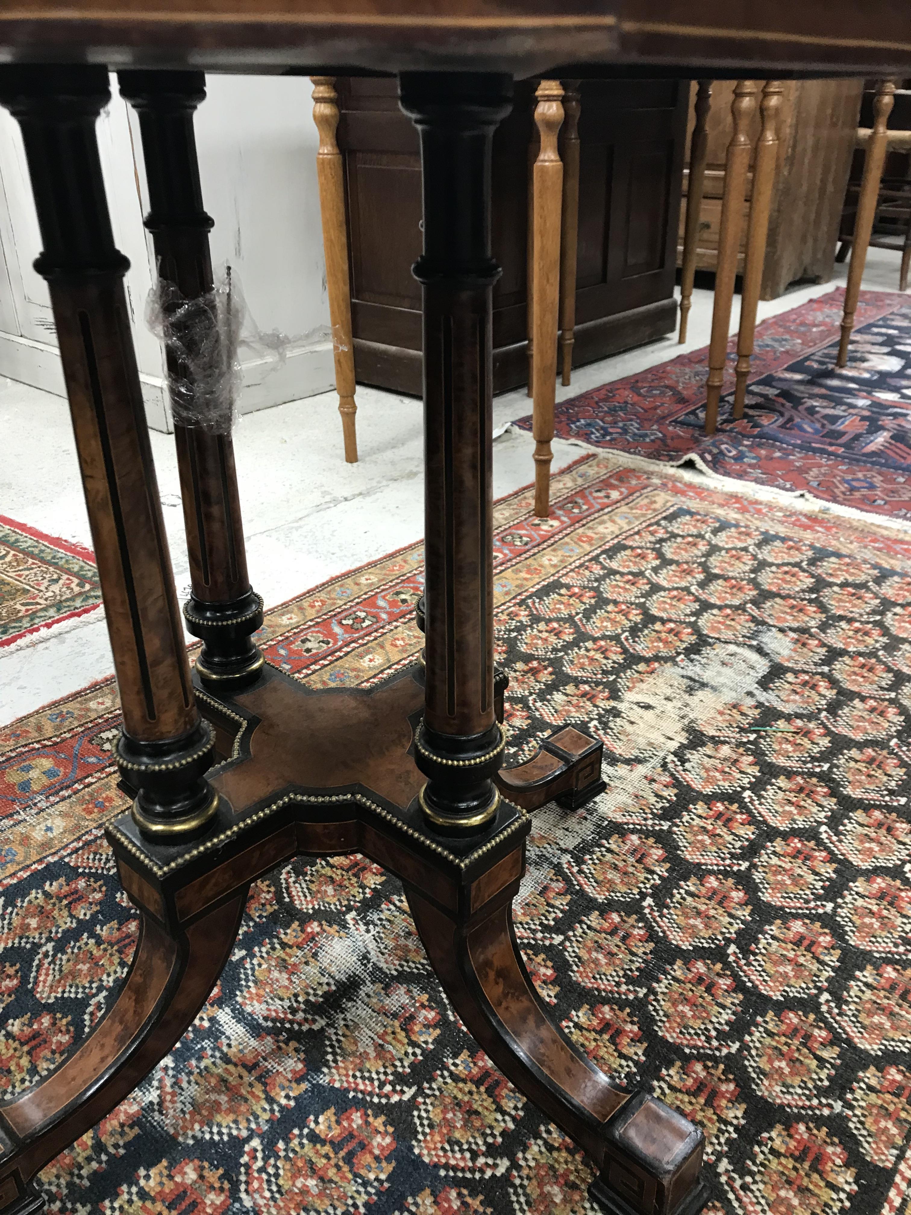 A Victorian amboyna and ebonised centre table, - Image 10 of 34