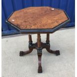 A Victorian amboyna and ebonised centre table,