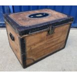 A 19th Century pine hinge lidded box with metal binding and brass studs,