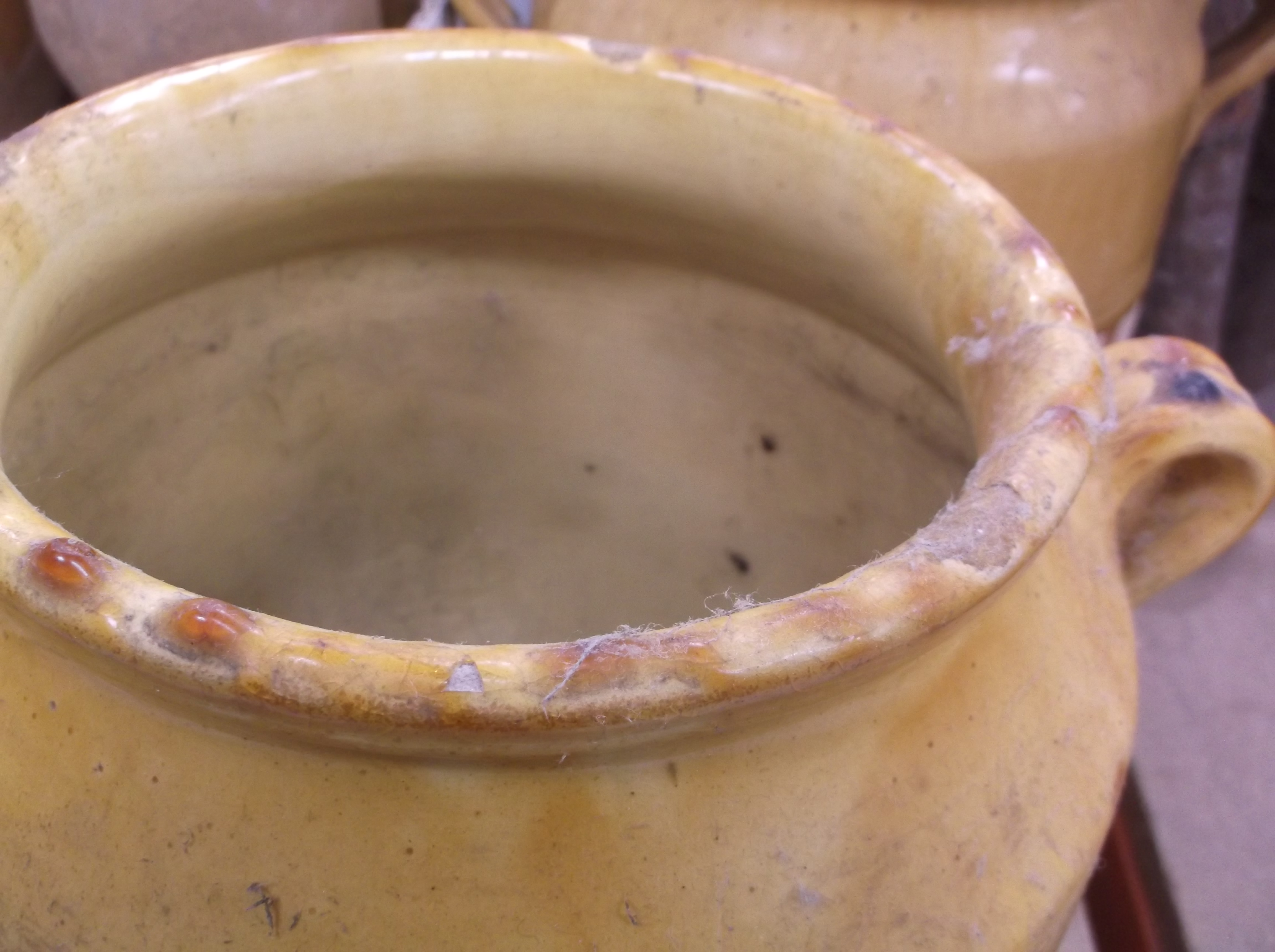 A collection of four 19th Century and later French ochre part glazed confit pots with lug handles, - Image 10 of 21