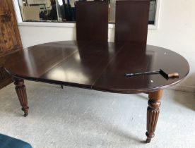 A Victorian mahogany extending dining table,