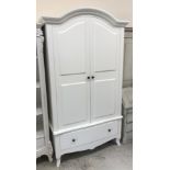 A modern white painted two door wardrobe with single drawer,