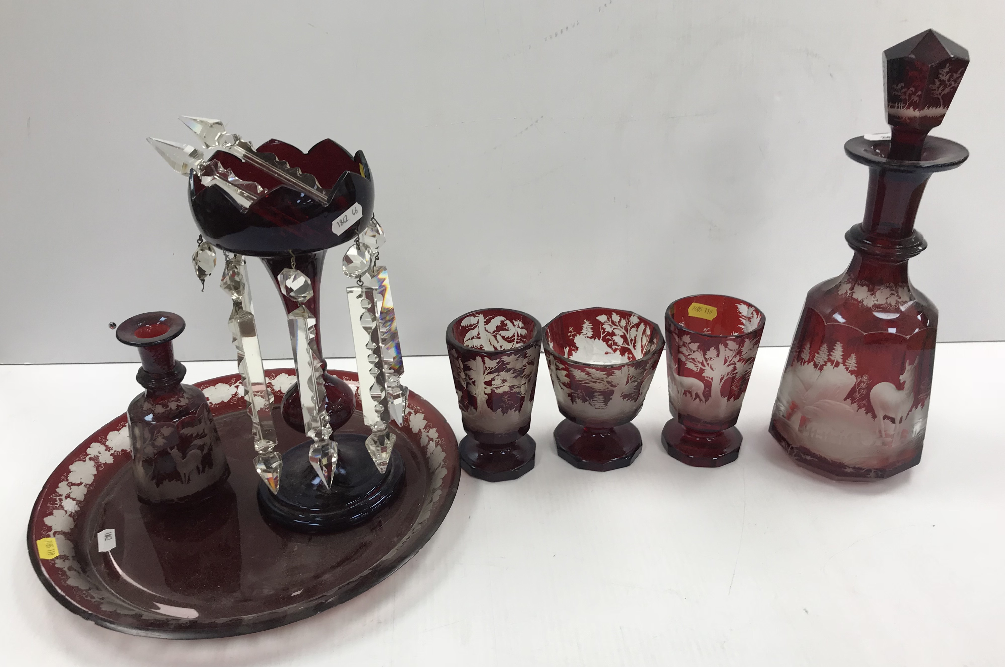 A Bohemian ruby overlaid cut glass decanter and stopper,