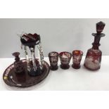 A Bohemian ruby overlaid cut glass decanter and stopper,