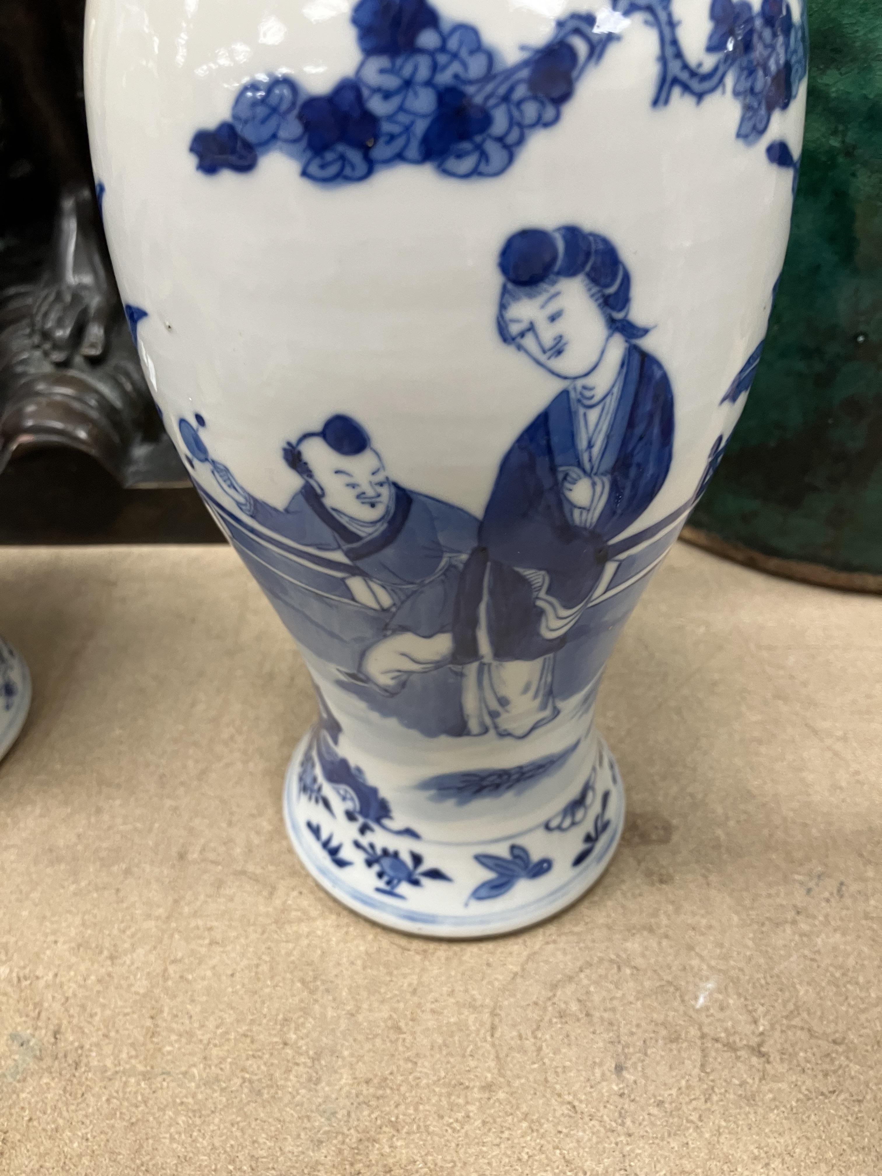 A pair of 19th Century Chinese blue and white baluster shaped vases and covers, - Image 17 of 54