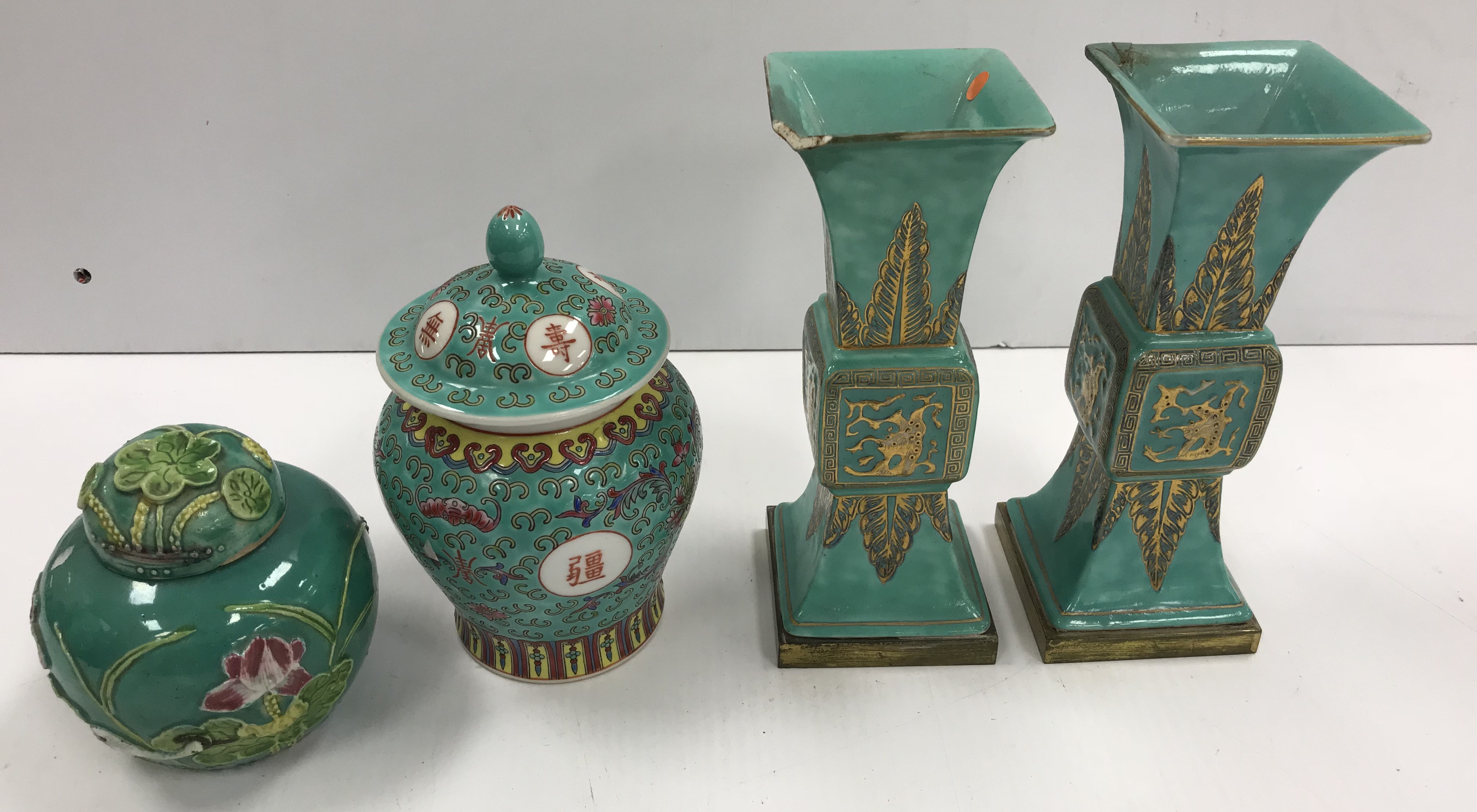 A pair of Chinese turquoise glazed gu vases of flared square form,