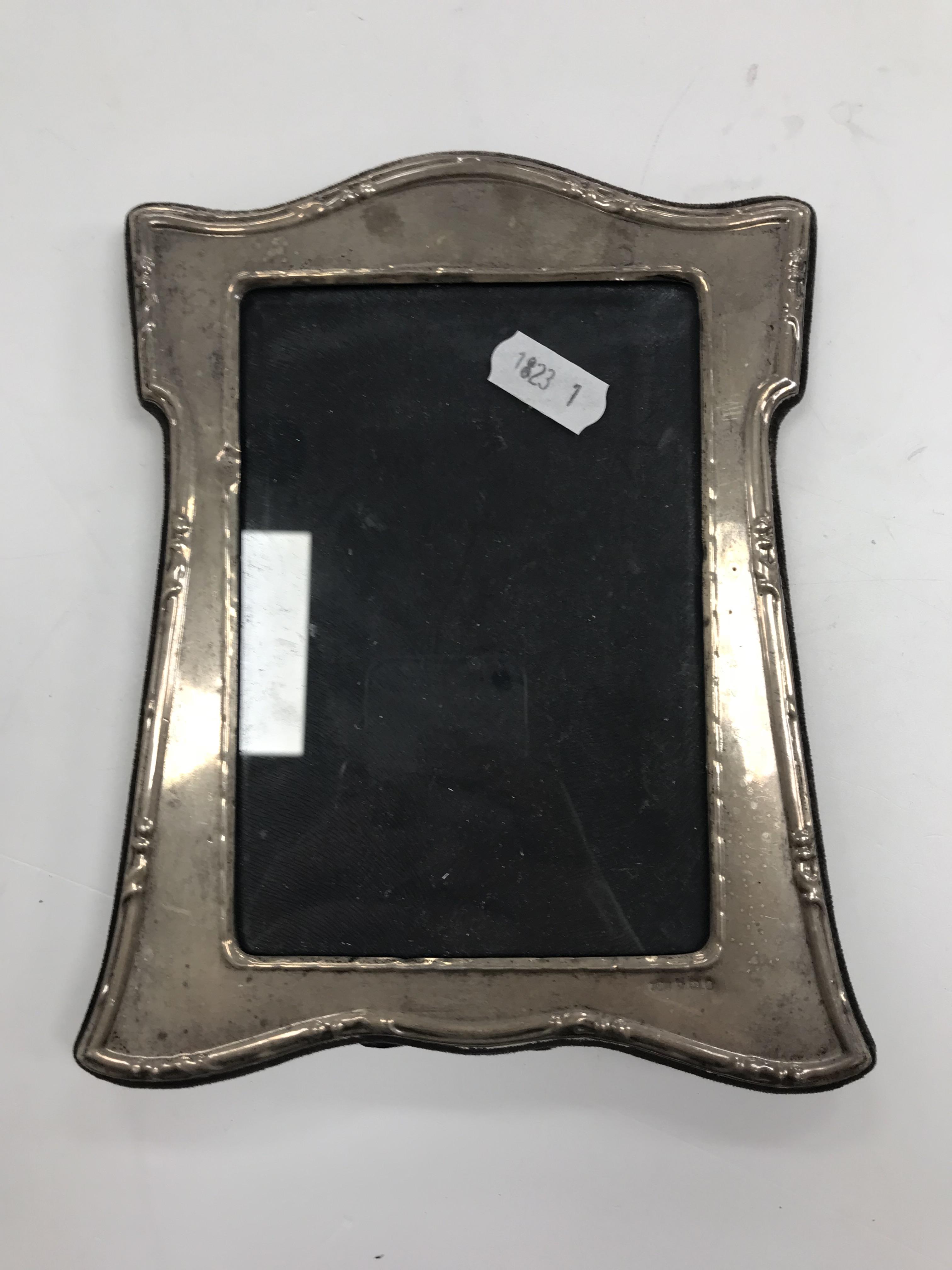 A modern silver embossed framed photograph frame in the Art Nouveau manner (by P.J.