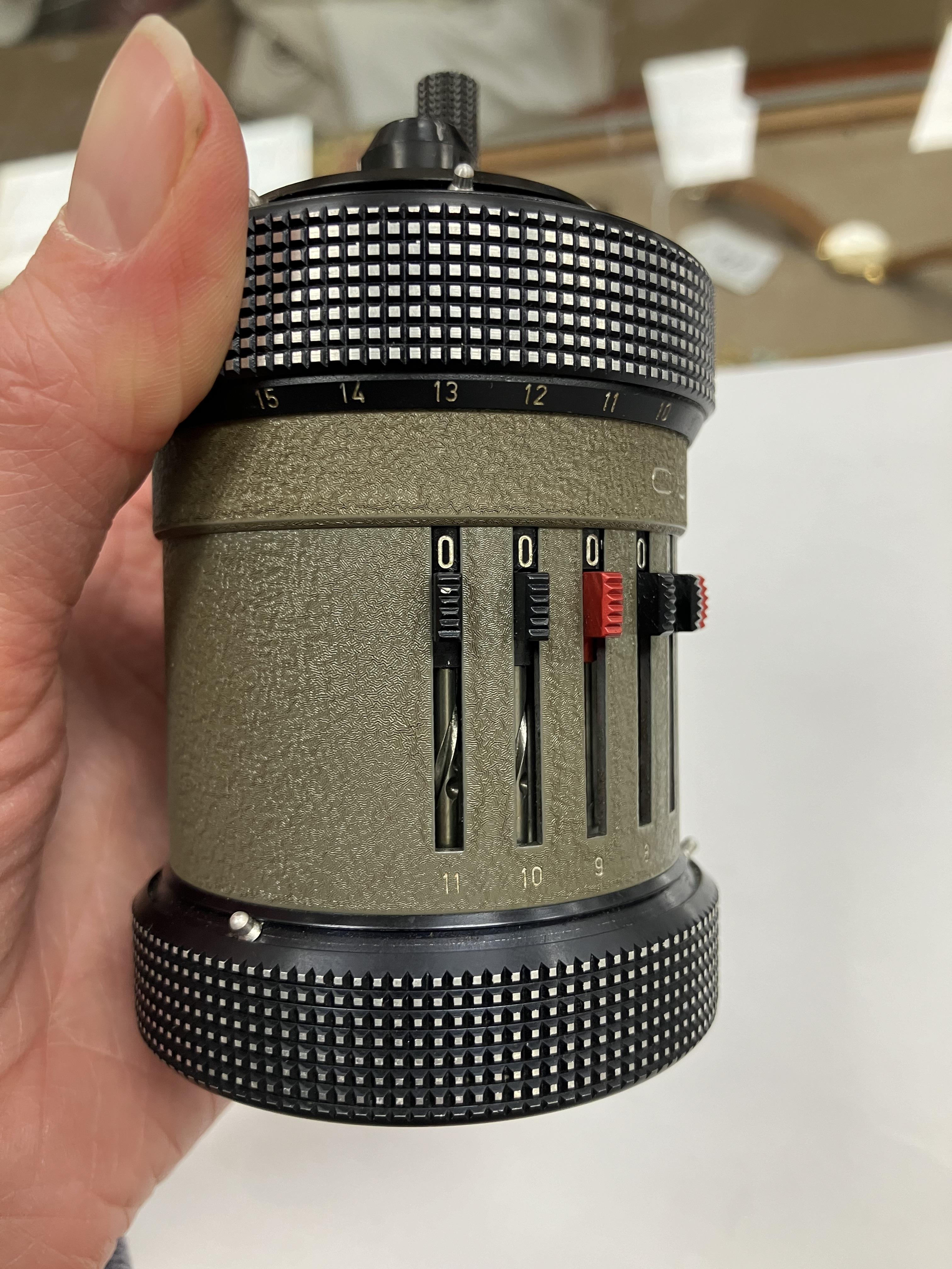 A Curta type 2 calculator with military green type main body inscribed to base "Type 2 No 523646 - Image 14 of 22
