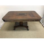 A Regency yew wood rosewood cross banded and brass inlaid breakfast table,