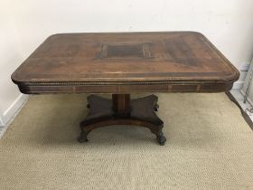 A Regency yew wood rosewood cross banded and brass inlaid breakfast table,