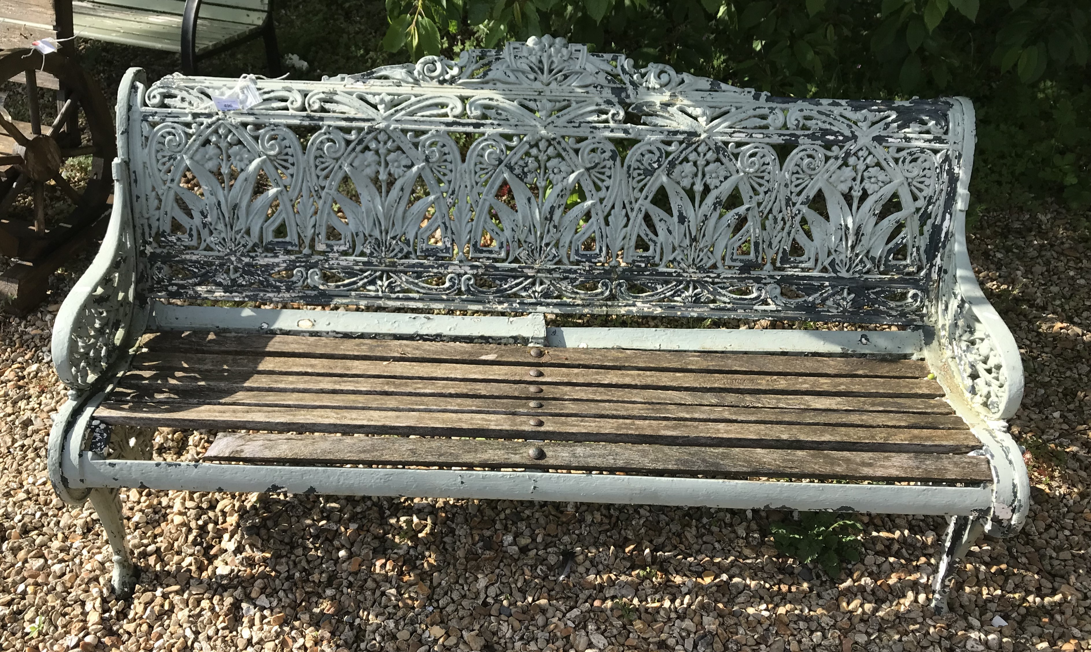 A Coalbrookdale style cast iron garden bench,