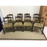 A set of eight 19th Century mahogany bar back dining chairs with upholstered seats on turned and