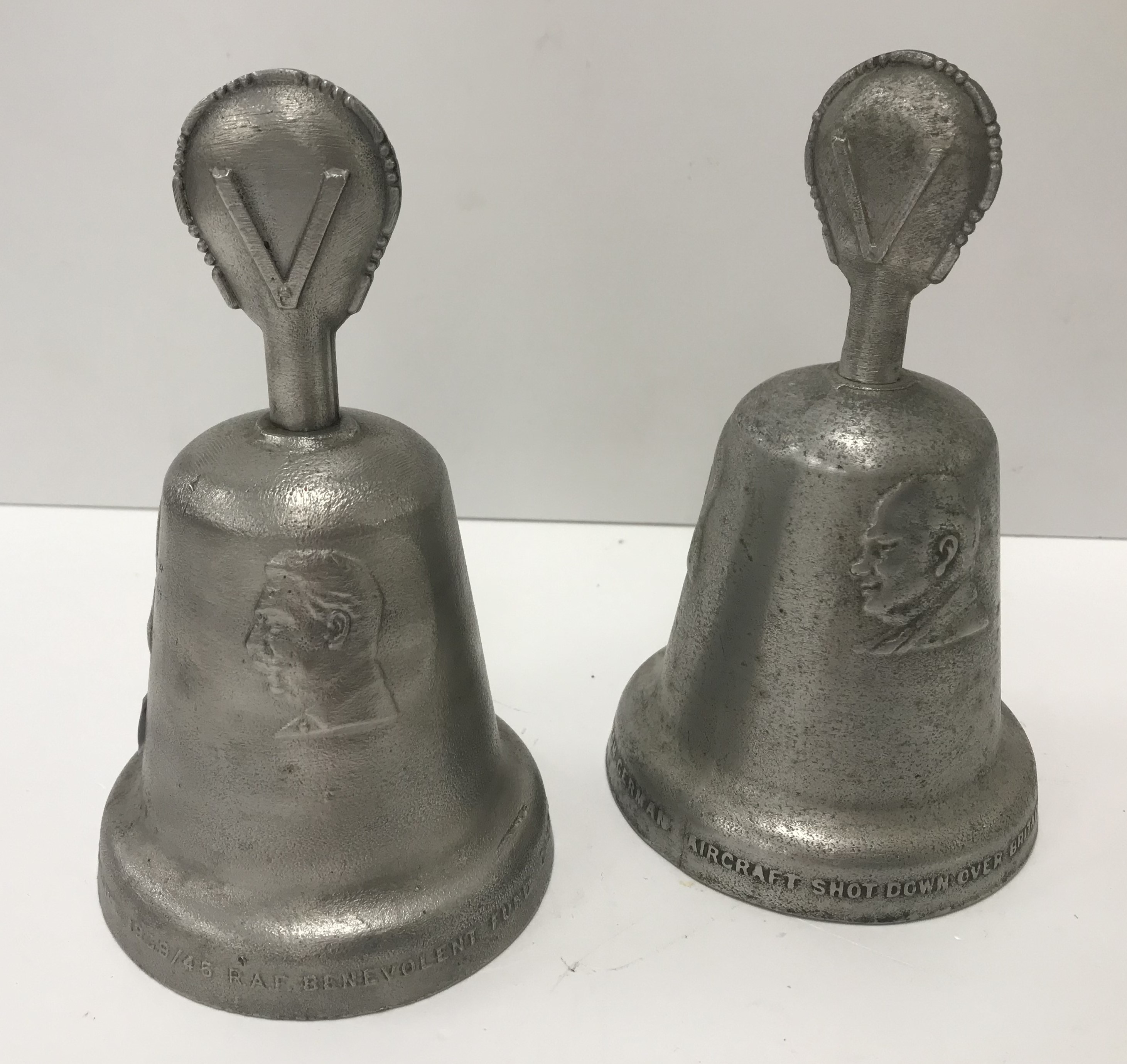 Two aluminium table bells inscribed "RAF Benevolent Fund cast with metal from German aircraft shot