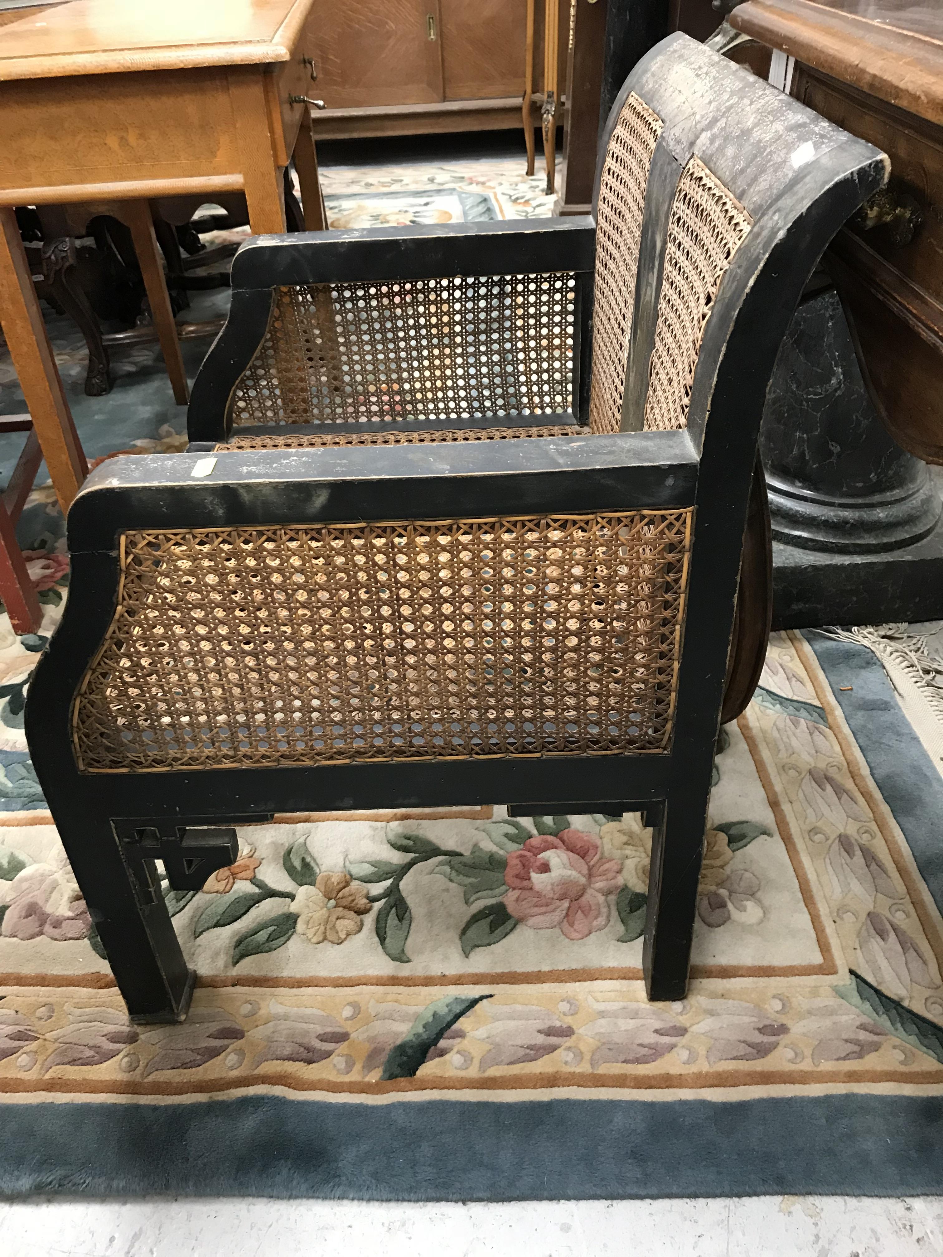 A pair of early 20th Century black lacquered and chinoiserie decorated caned low arm chairs on - Image 33 of 36