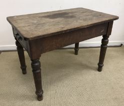 A 19th Century oak kitchen table,