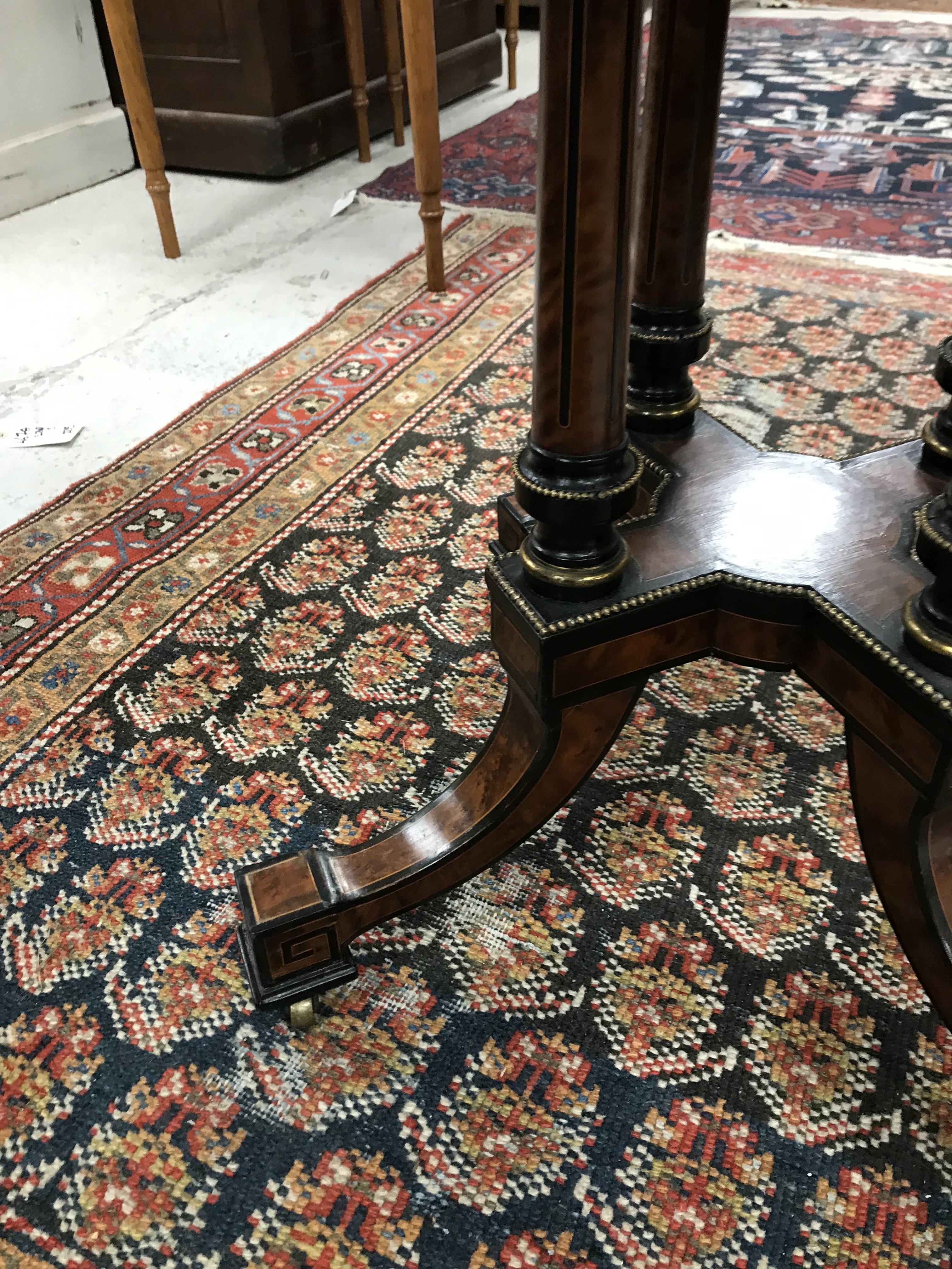 A Victorian amboyna and ebonised centre table, - Image 18 of 34