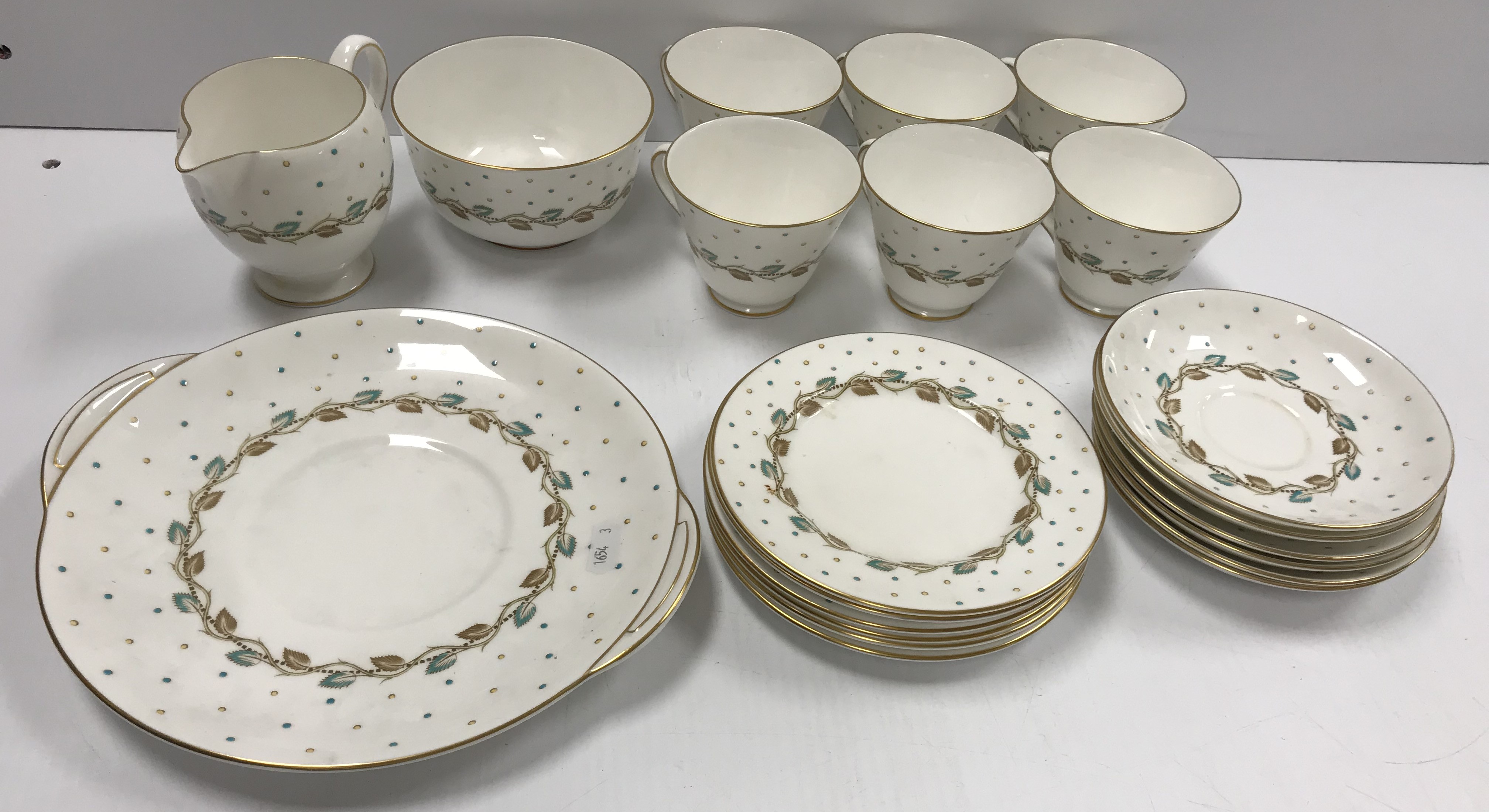 A Royal Doulton "Harmony Leaf" (H4864) six place tea set comprising cups, saucers, side plates,