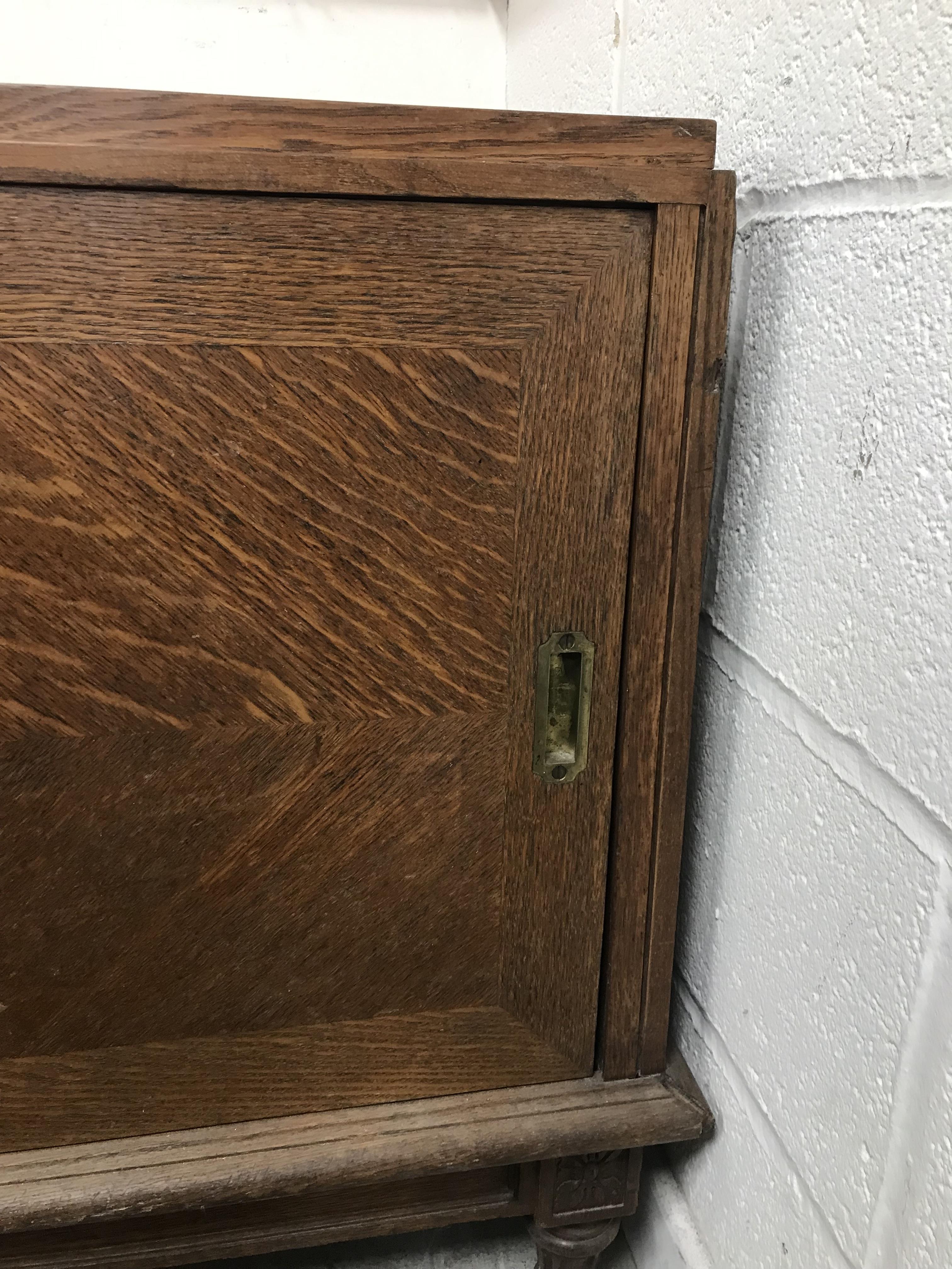 A mid 20th Century oak side cabinet formerly from a French haberdashery, - Bild 4 aus 63