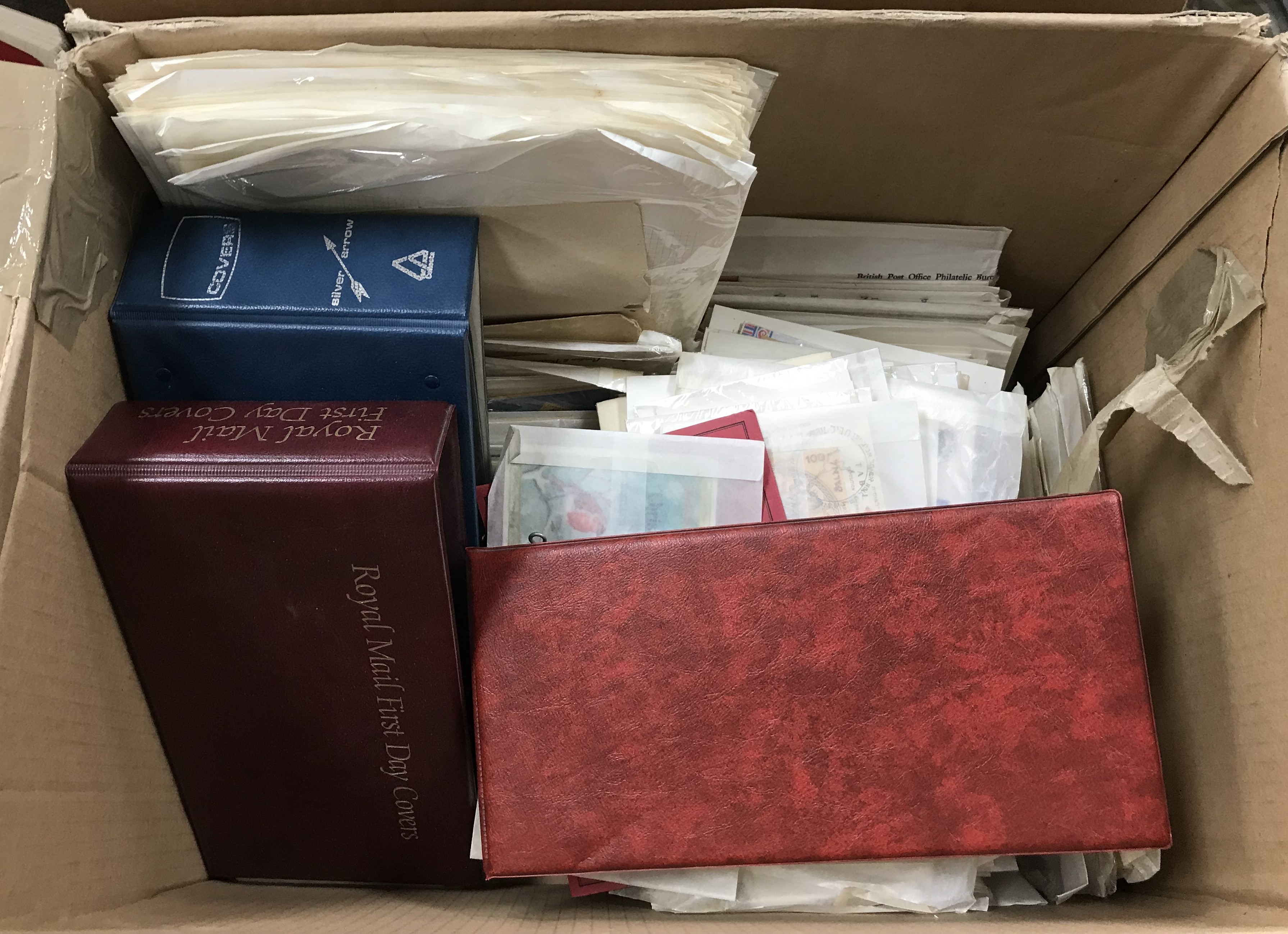 Two boxes containing a collection of mainly First Day Covers in albums and loose