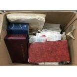 Two boxes containing a collection of mainly First Day Covers in albums and loose