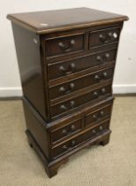 A reproduction mahogany miniature chest on chest,