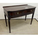 An Edwardian mahogany serving table in the Adam taste,