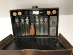 A leather cased travelling apothecary /