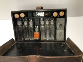 A leather cased travelling apothecary /