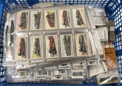 A collection of cigarette cards Trains a