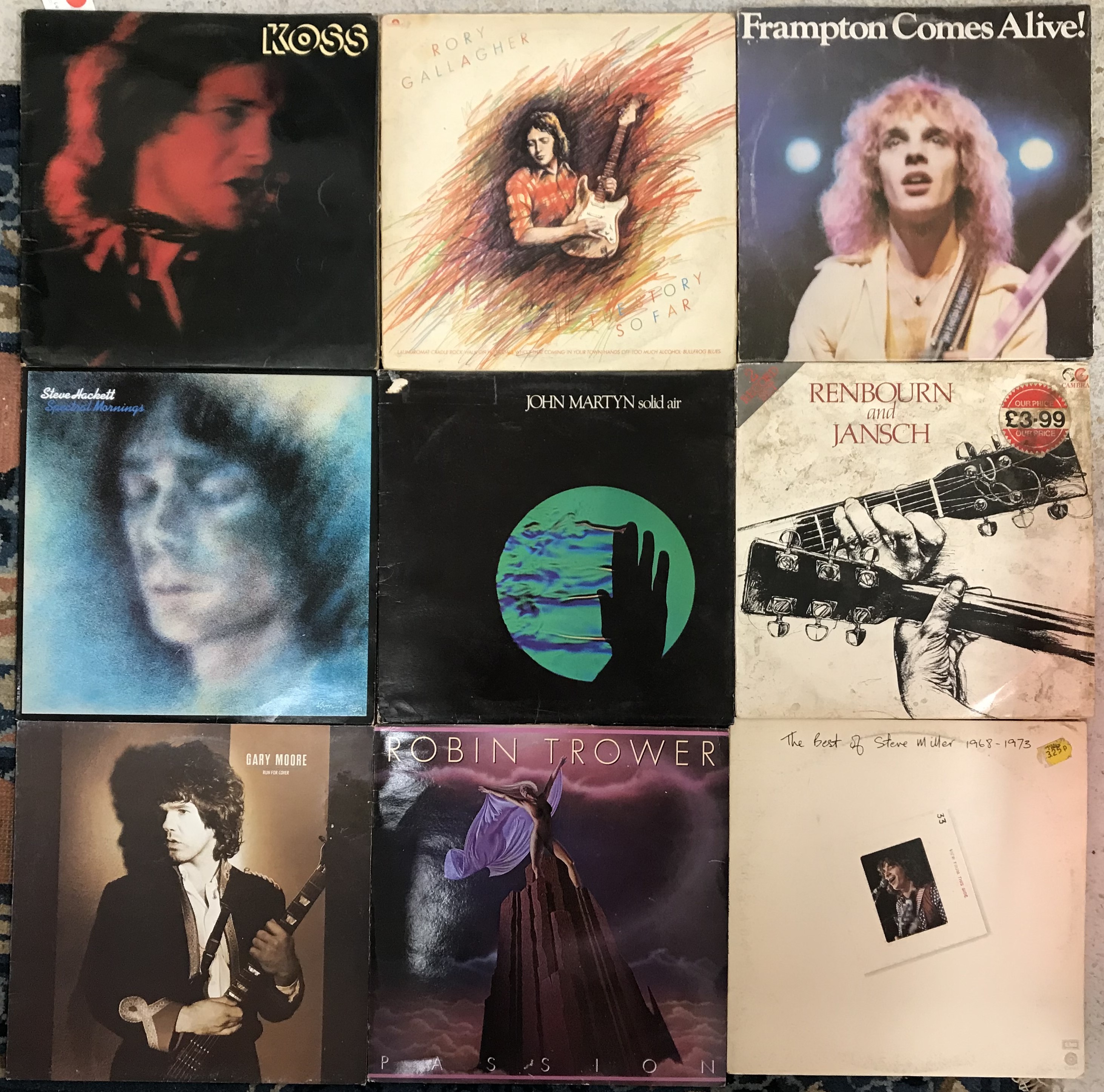 A collection of guitar greats LPs includ
